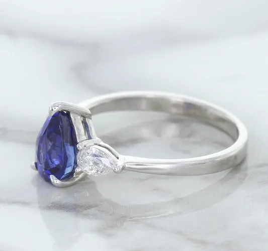 1.80ct. Pear Blue Sapphire Ring with Diamond Accents in 18K White Gold