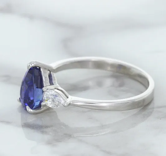 1.80ct. Pear Blue Sapphire Ring with Diamond Accents in 18K White Gold