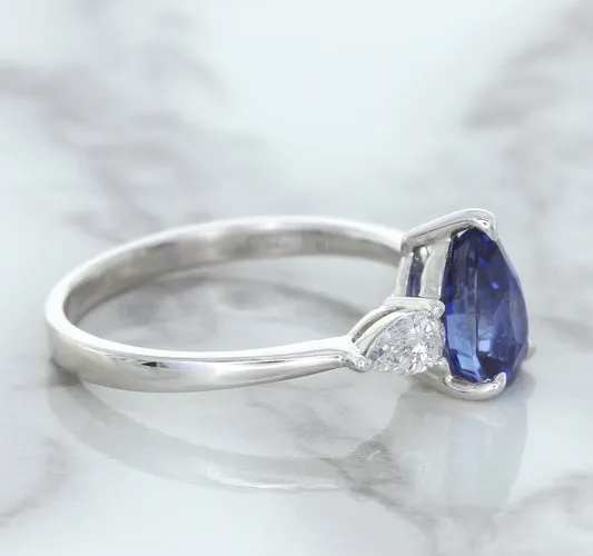 1.80ct. Pear Blue Sapphire Ring with Diamond Accents in 18K White Gold
