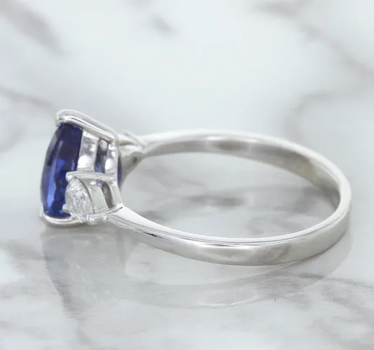 1.80ct. Pear Blue Sapphire Ring with Diamond Accents in 18K White Gold