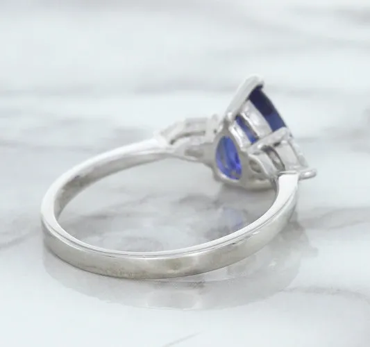 1.80ct. Pear Blue Sapphire Ring with Diamond Accents in 18K White Gold