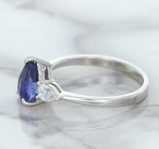 1.80ct. Pear Blue Sapphire Ring with Diamond Accents in 18K White Gold