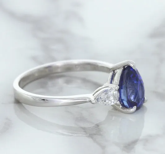 1.80ct. Pear Blue Sapphire Ring with Diamond Accents in 18K White Gold