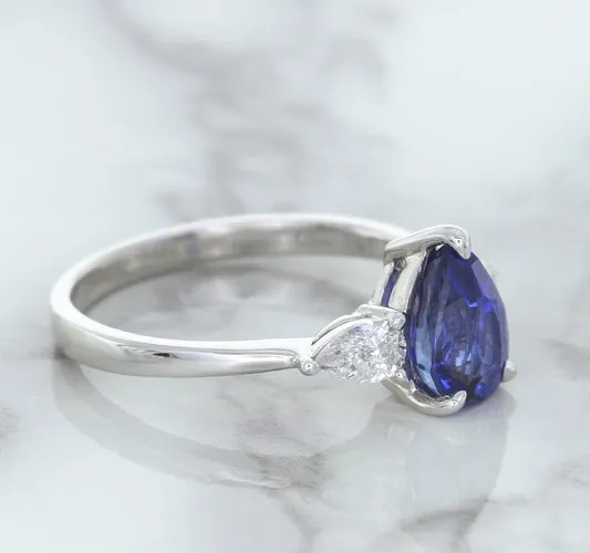 1.80ct. Pear Blue Sapphire Ring with Diamond Accents in 18K White Gold