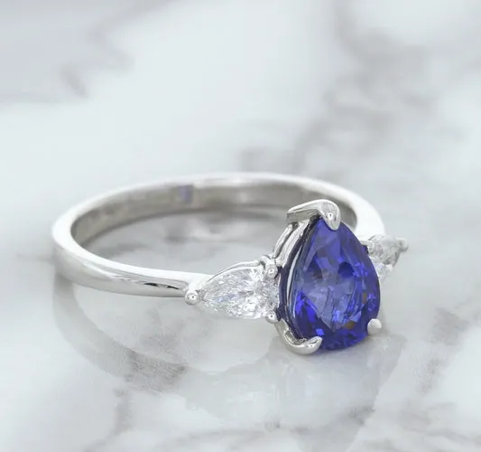 1.80ct. Pear Blue Sapphire Ring with Diamond Accents in 18K White Gold