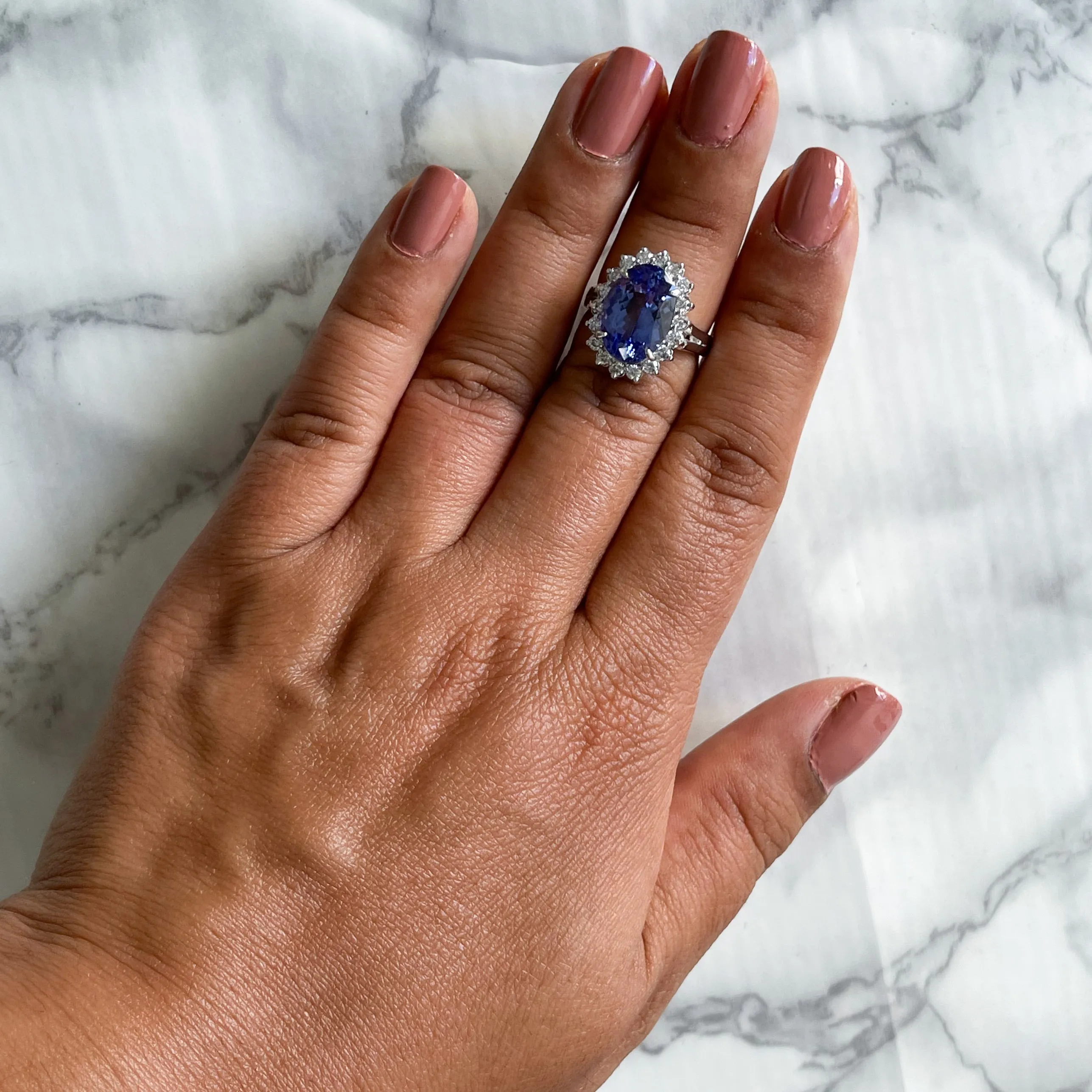 5.45ct Oval Tanzanite Ring with Diamond Halo in 14K White Gold