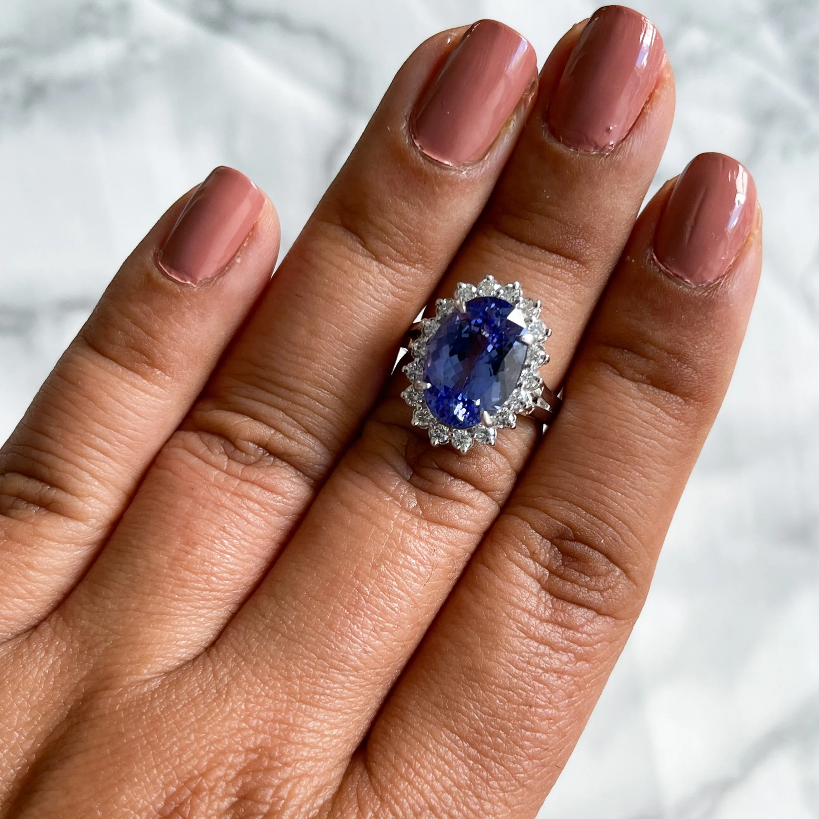 5.45ct Oval Tanzanite Ring with Diamond Halo in 14K White Gold
