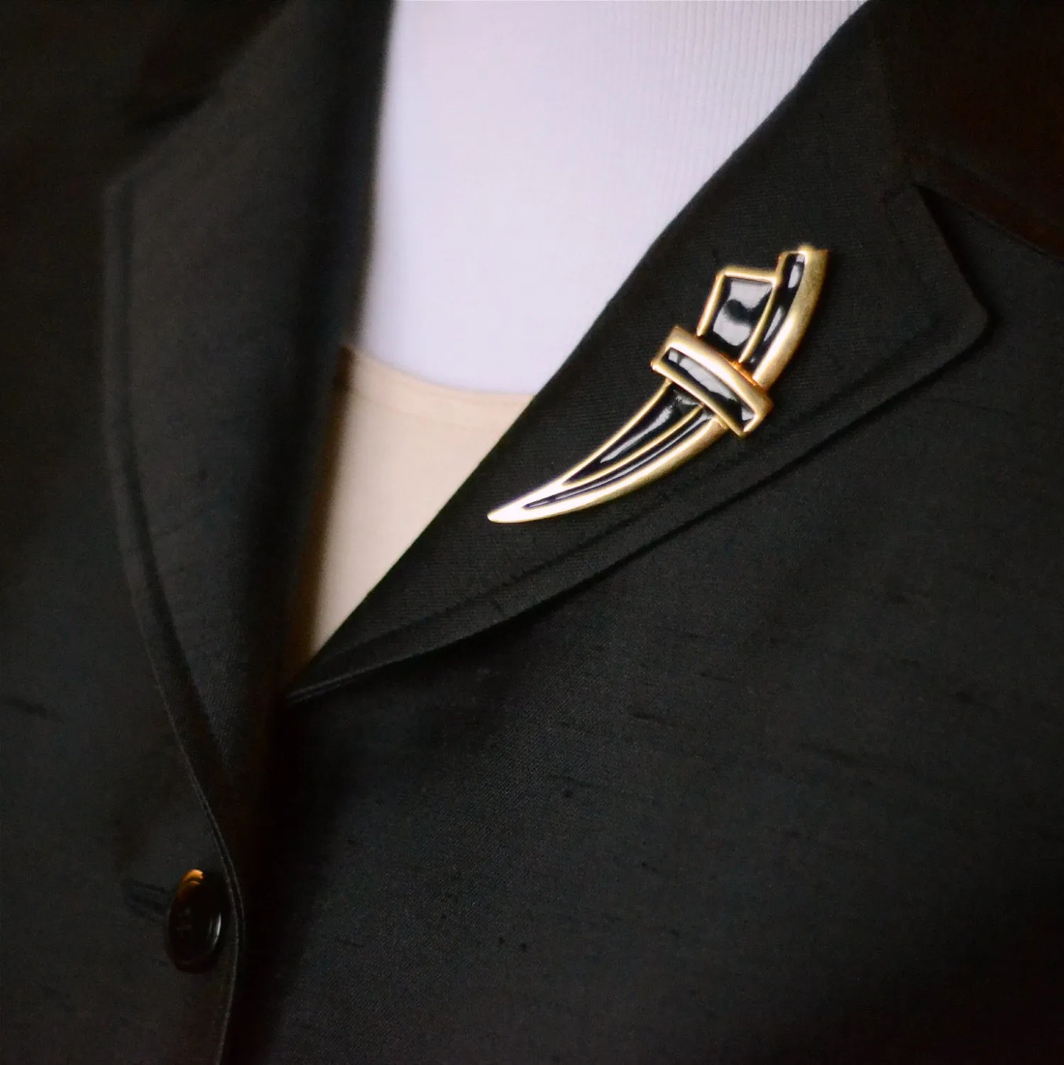 Black and Gold Crest Brooch by Monet