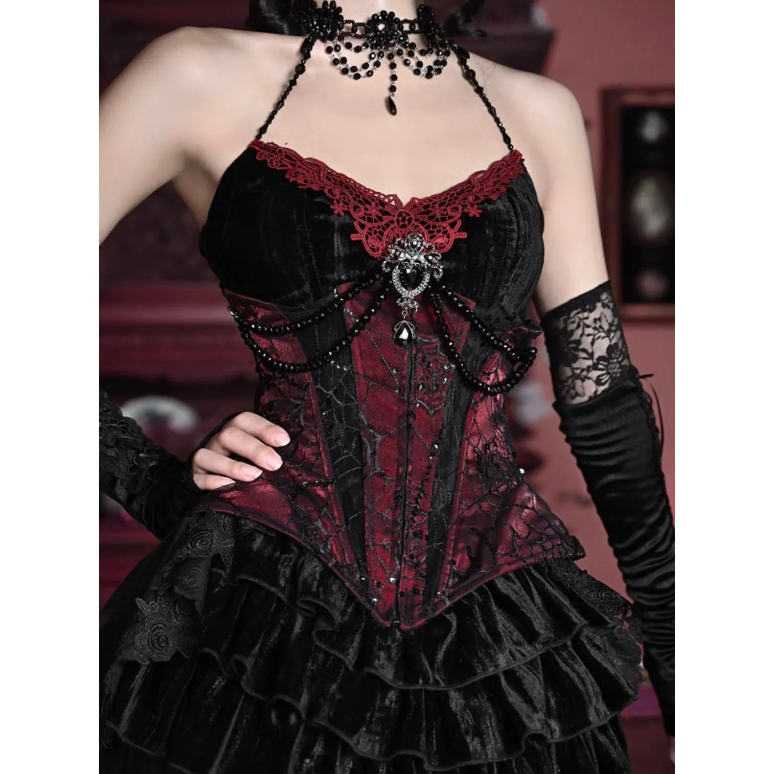 Duchess' embroidered camisole and spider web corset