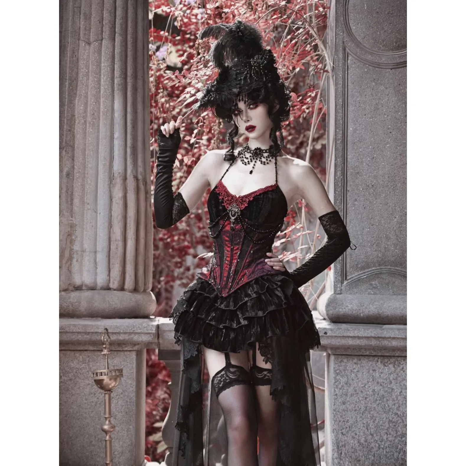 Duchess' embroidered camisole and spider web corset