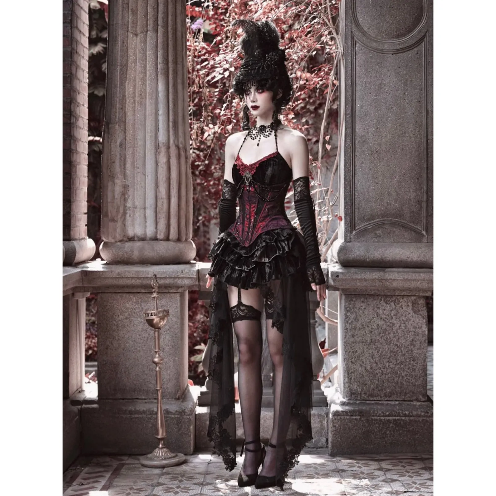 Duchess' embroidered camisole and spider web corset
