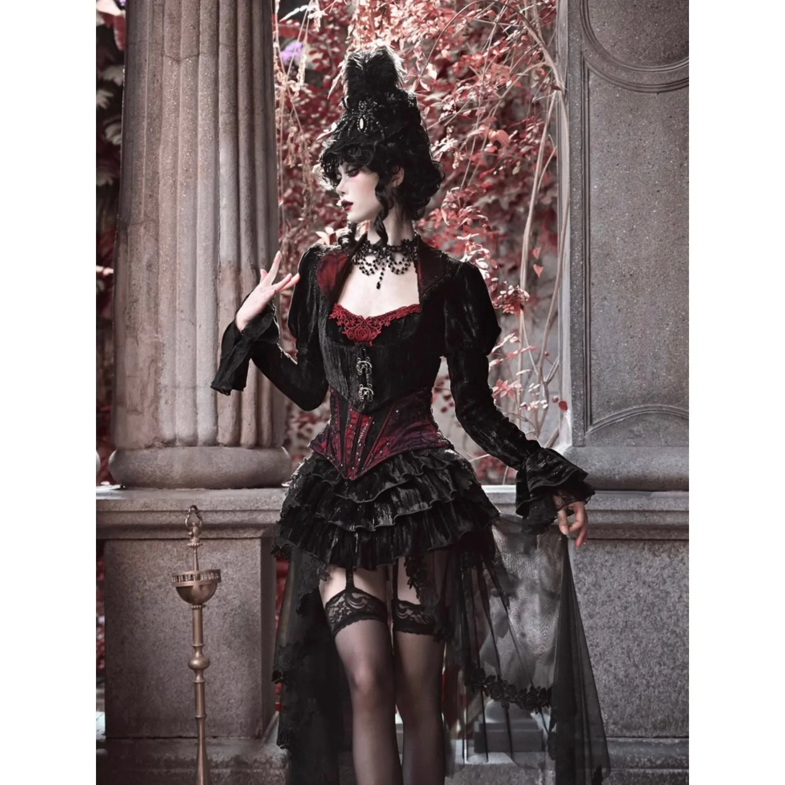 Duchess' embroidered camisole and spider web corset