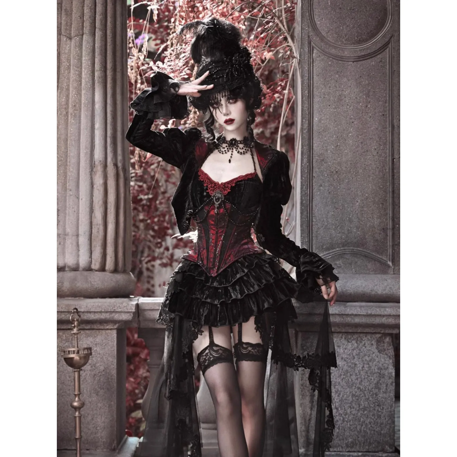 Duchess' embroidered camisole and spider web corset