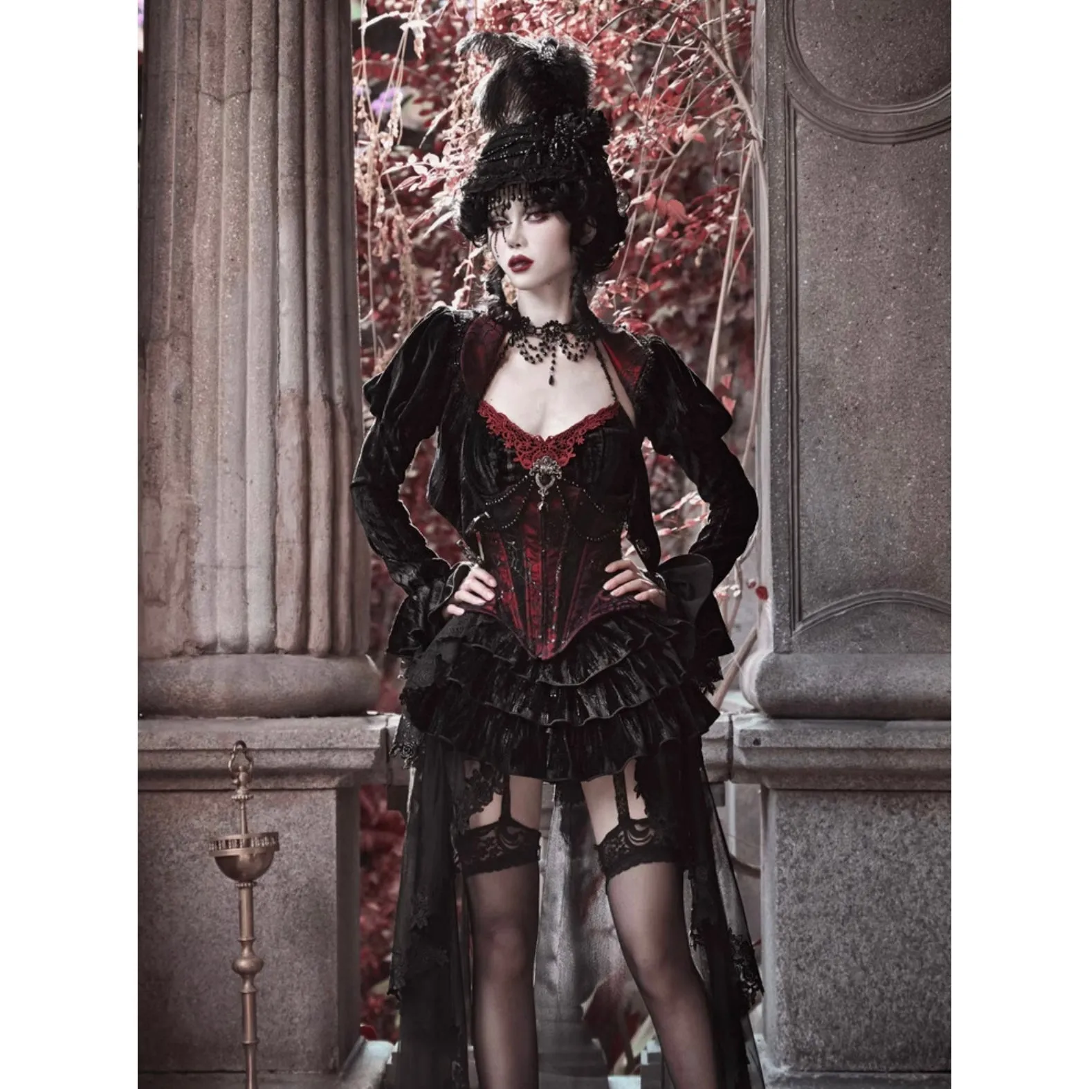 Duchess' embroidered camisole and spider web corset