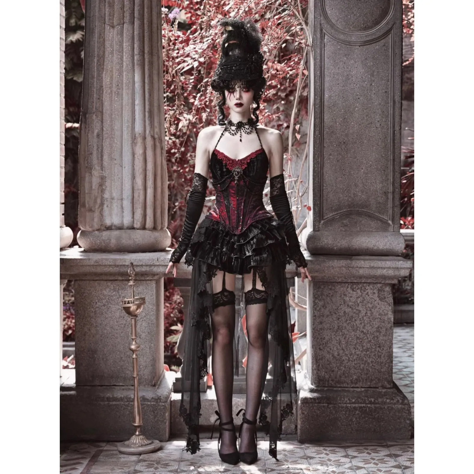 Duchess' embroidered camisole and spider web corset