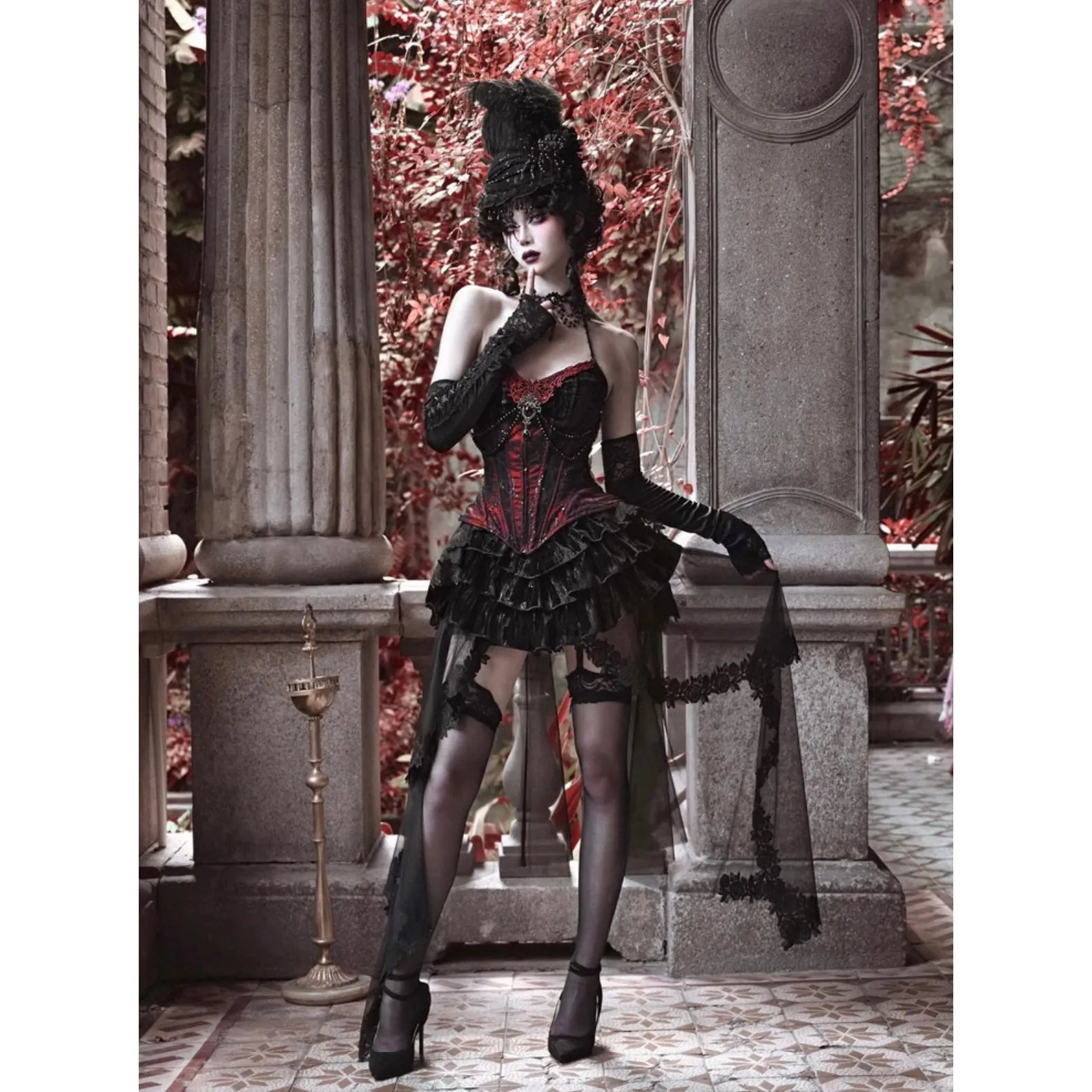 Duchess' embroidered camisole and spider web corset