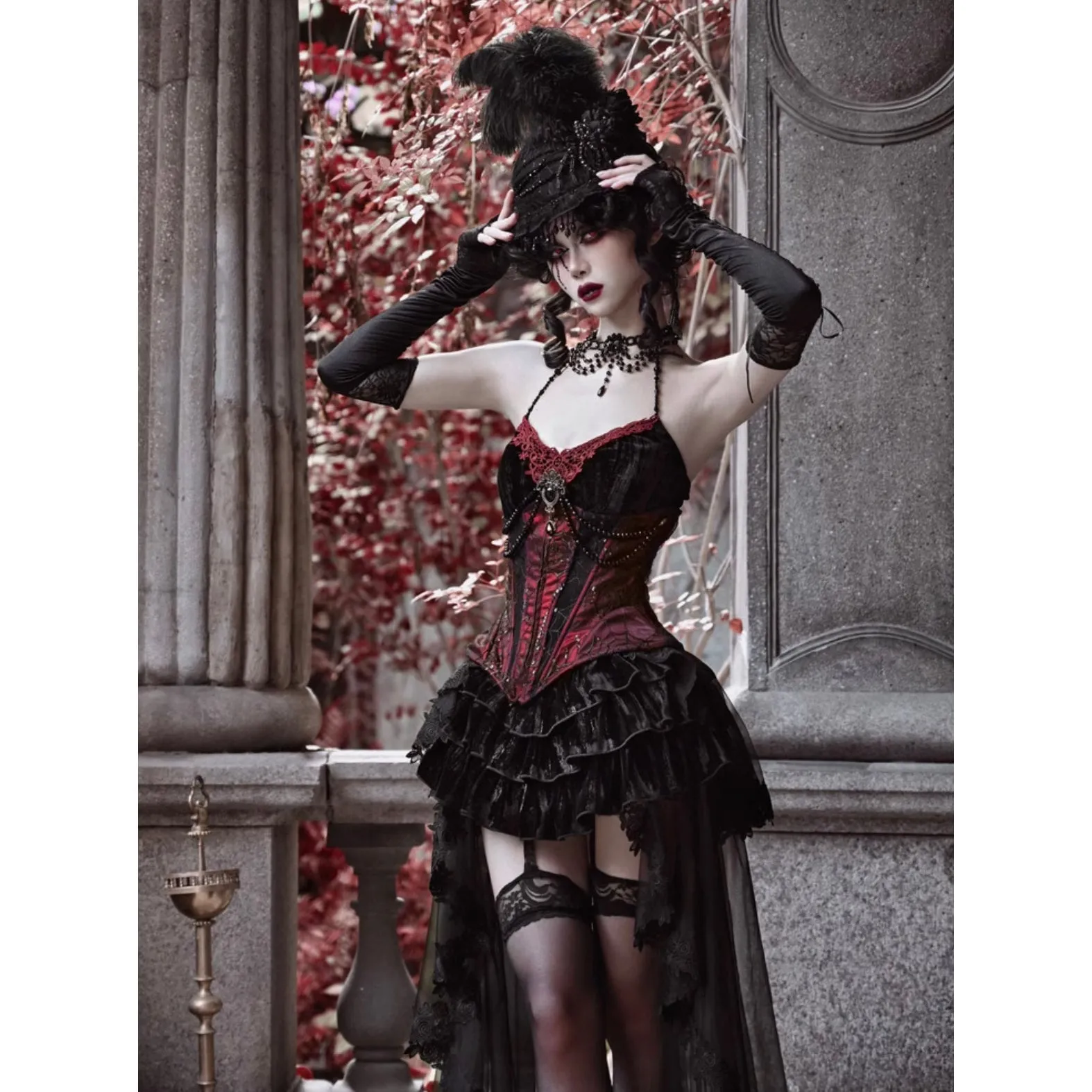 Duchess' embroidered camisole and spider web corset