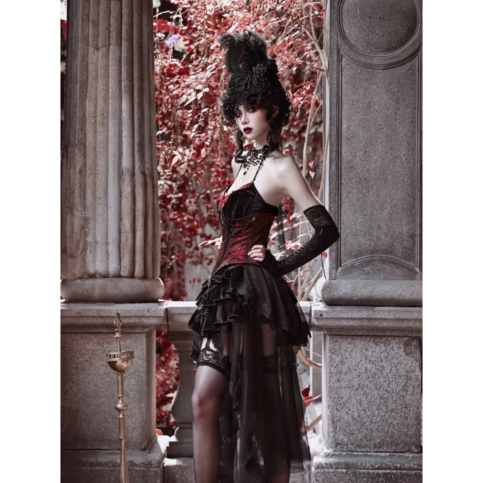 Duchess' embroidered camisole and spider web corset