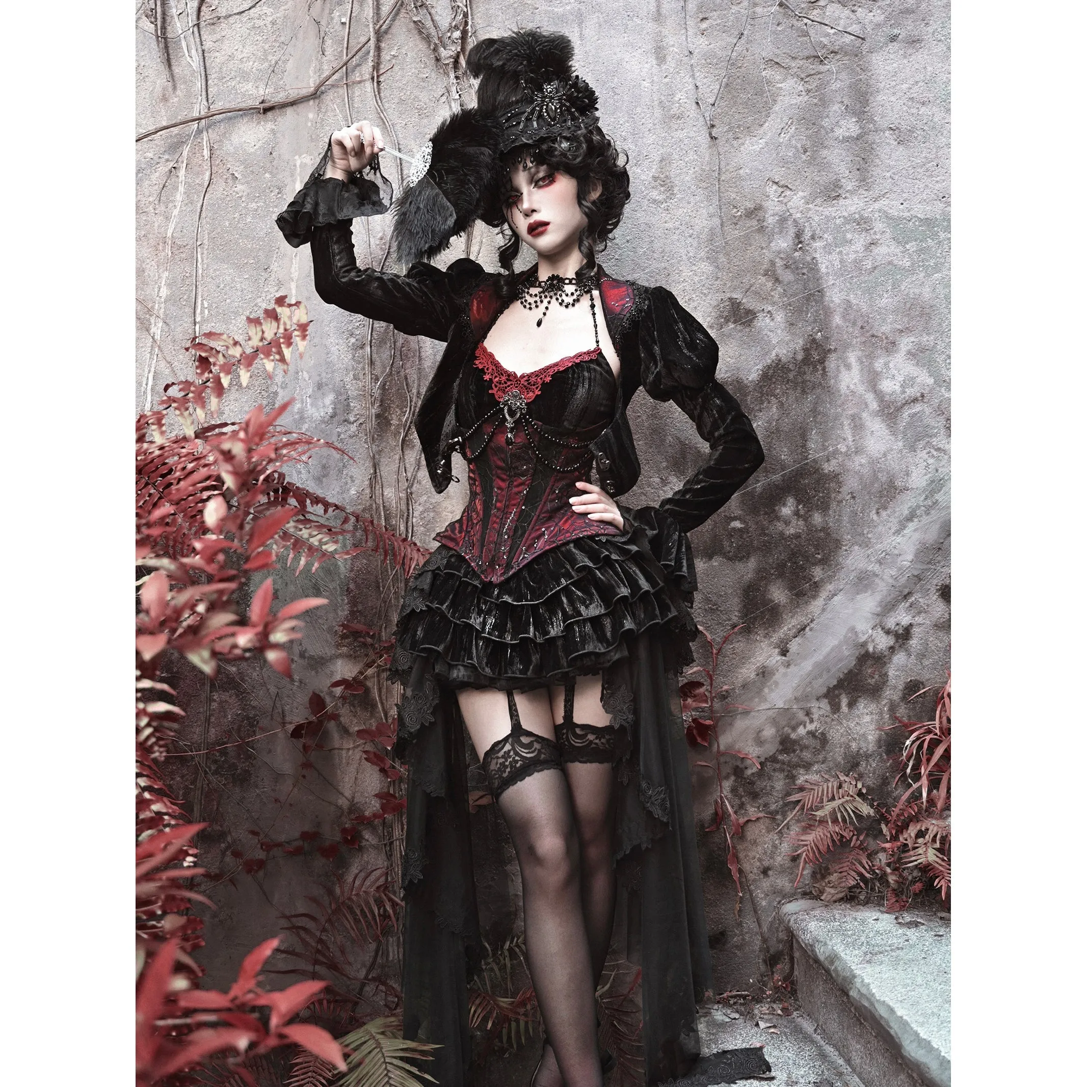 Duchess' embroidered camisole and spider web corset