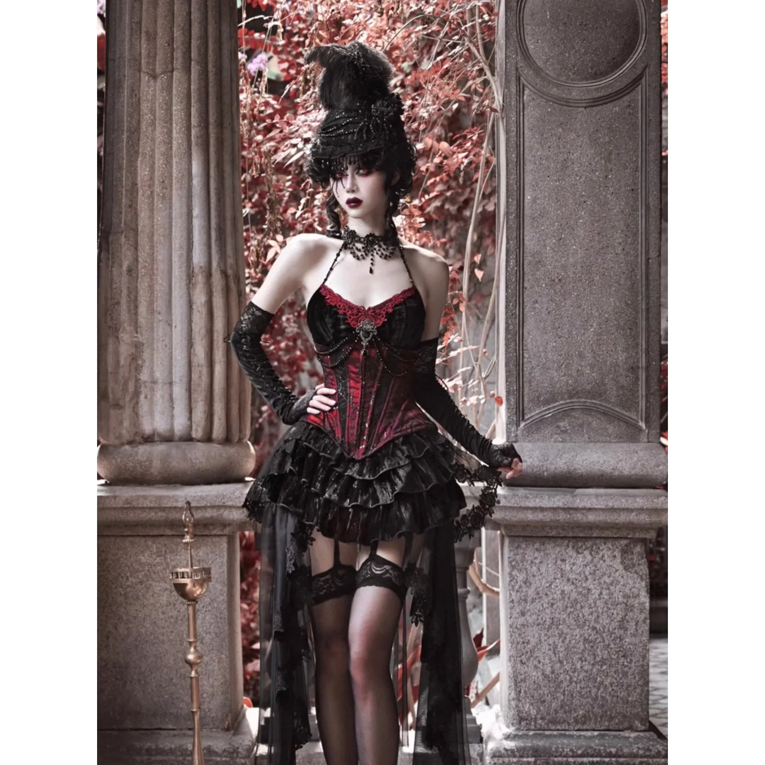 Duchess' embroidered camisole and spider web corset