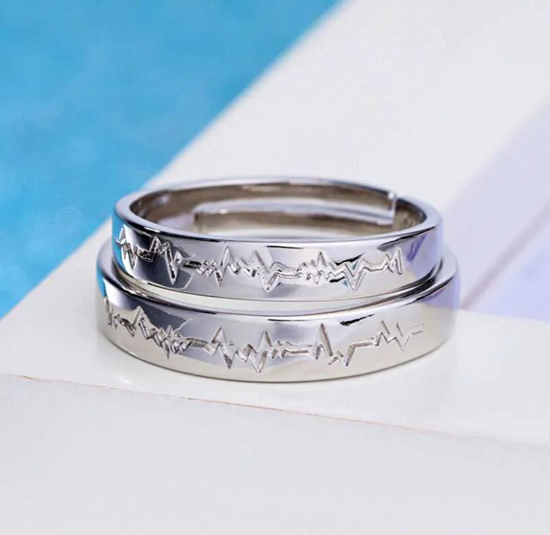 Karatcart Elegant Couple Heartbeat Adjustable Band Ring for Men and Women