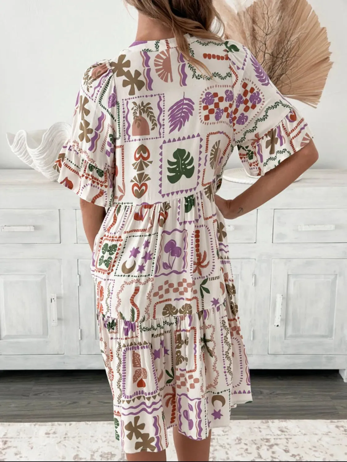 Tassel Printed Tie Neck Half Sleeve Mini Dress