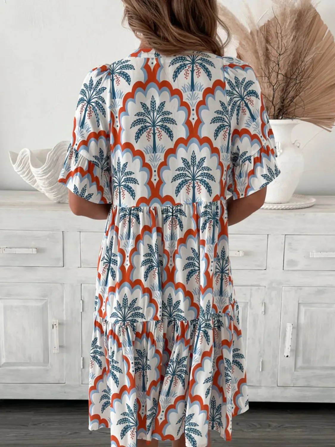 Tassel Printed Tie Neck Half Sleeve Mini Dress