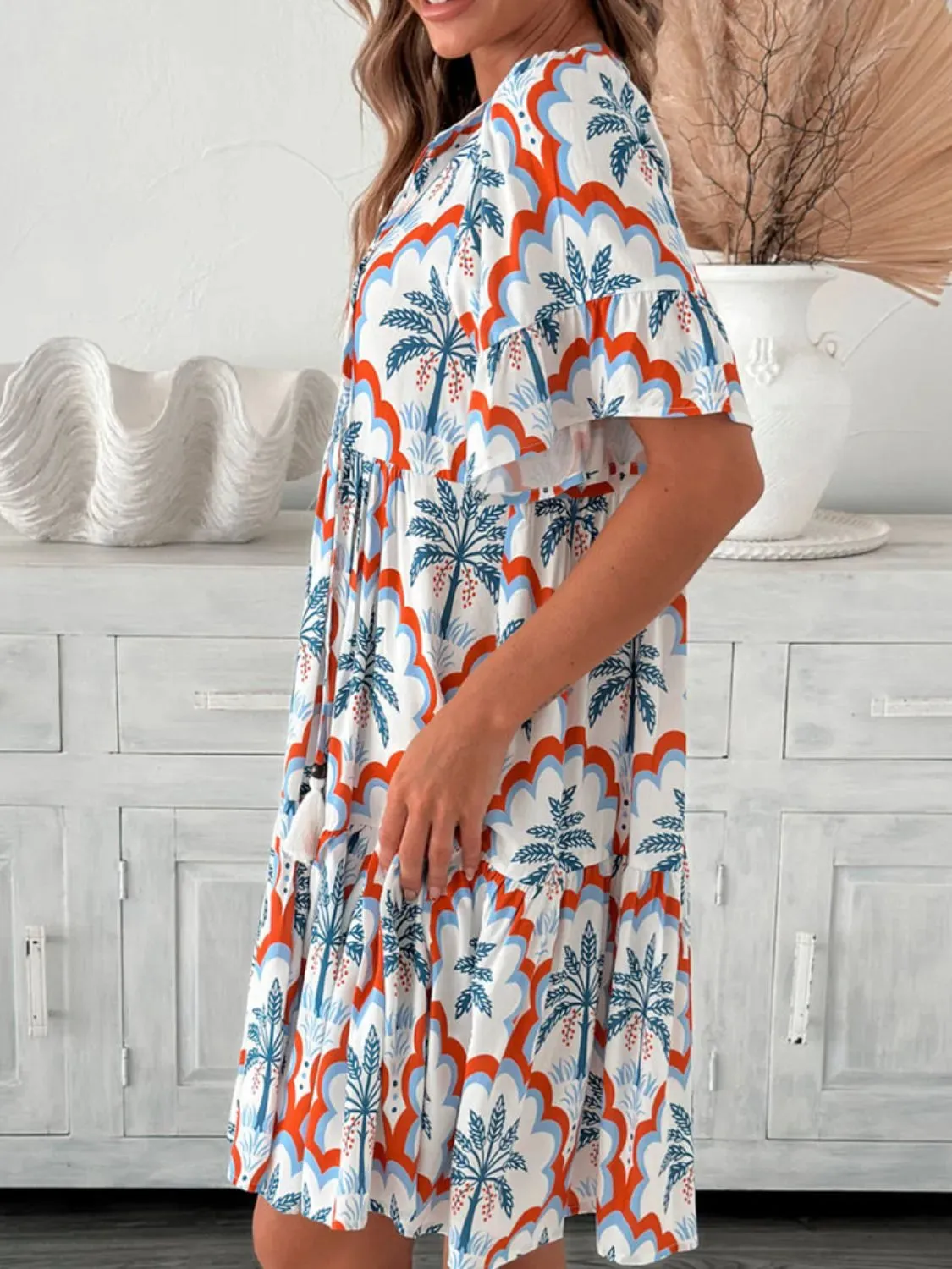 Tassel Printed Tie Neck Half Sleeve Mini Dress