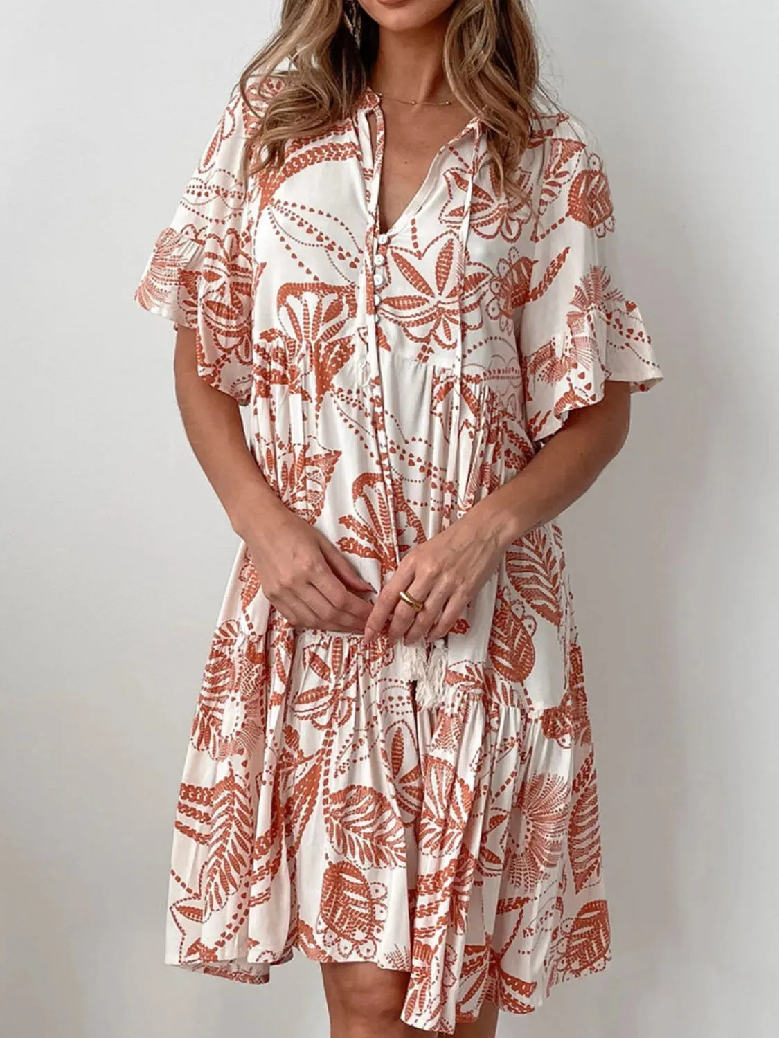 Tassel Printed Tie Neck Half Sleeve Mini Dress