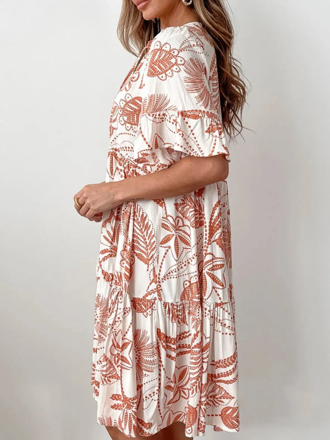 Tassel Printed Tie Neck Half Sleeve Mini Dress