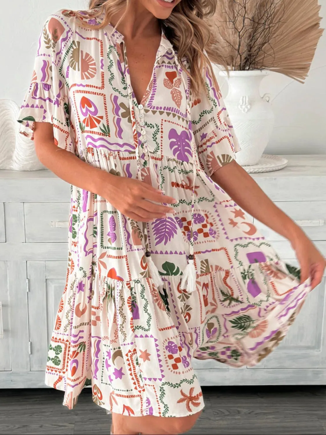 Tassel Printed Tie Neck Half Sleeve Mini Dress