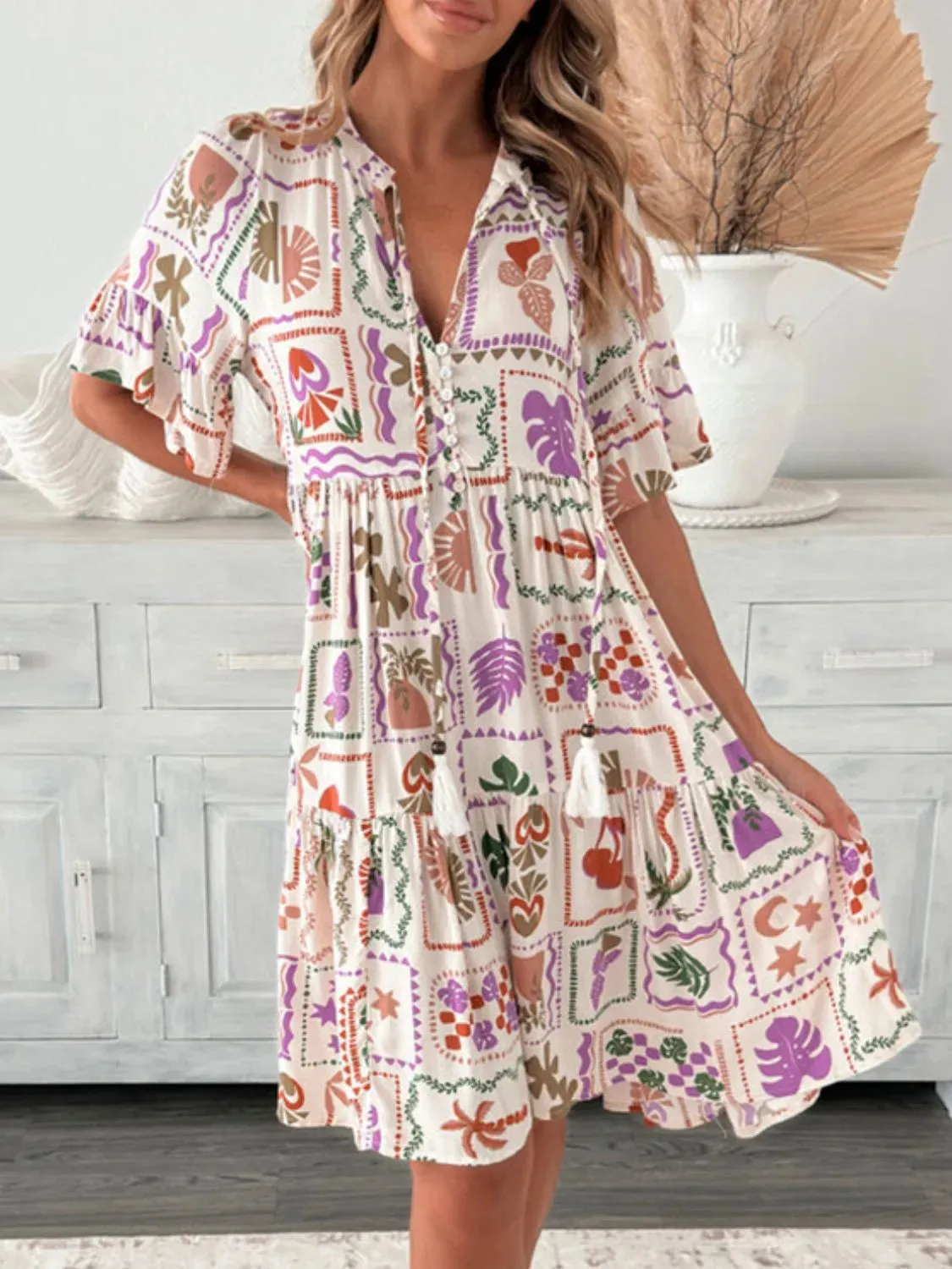 Tassel Printed Tie Neck Half Sleeve Mini Dress