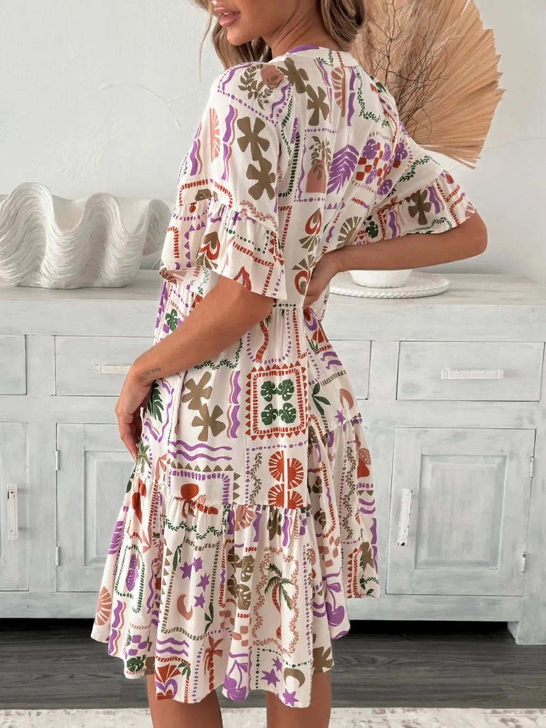 Tassel Printed Tie Neck Half Sleeve Mini Dress