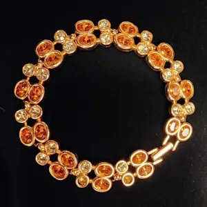 Vintage Joan Rivers Gold Tone Citrine and Orange Colored Rhinestone Tennis Style